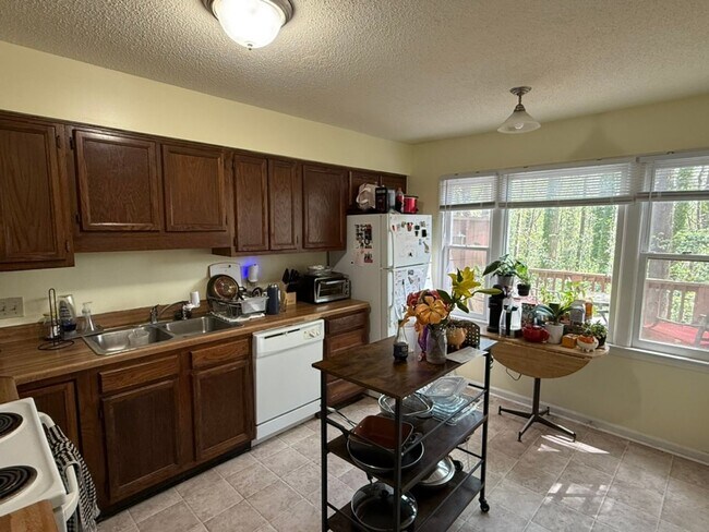 Building Photo - Available Early August! Close To NC State! 4-Bedroom, 3.5-Bathroom Townhouse!