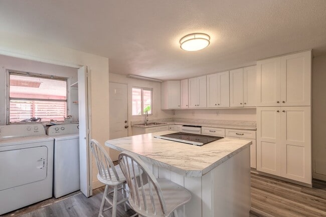 Building Photo - Attention boaters: Riverfront home, pet fr...