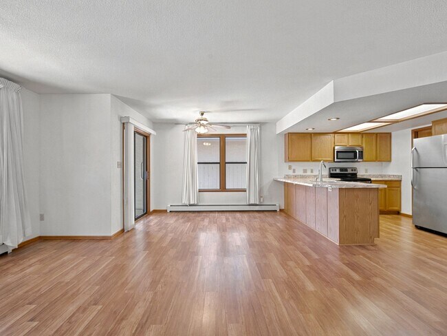Foto del edificio - Spacious 2BR Rental with Open Floor Plan & Low-Maintenance yard