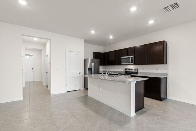 Building Photo - LIKE NEW Townhome For Rent in Mangrove Point!