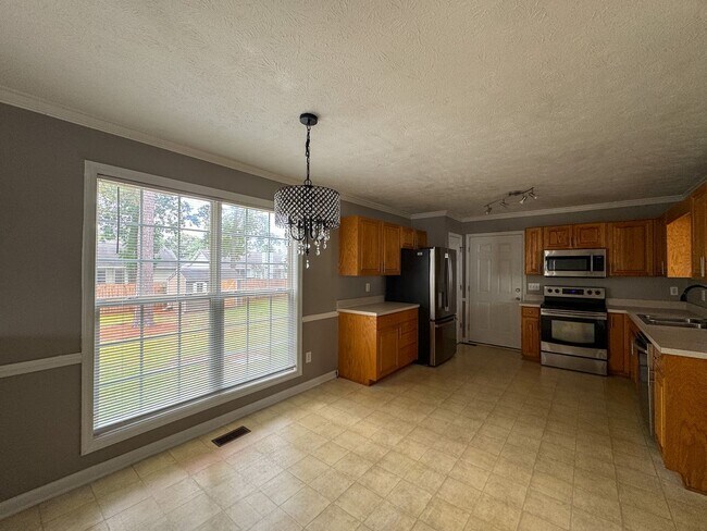 Foto del edificio - Cute 3 Bed 2.5 Bath Home in Fayetteville with Fenced Yard