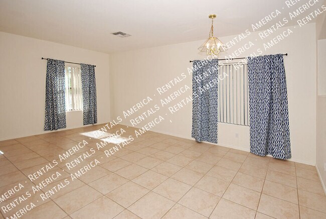 Building Photo - 4212 N 125th Ave
