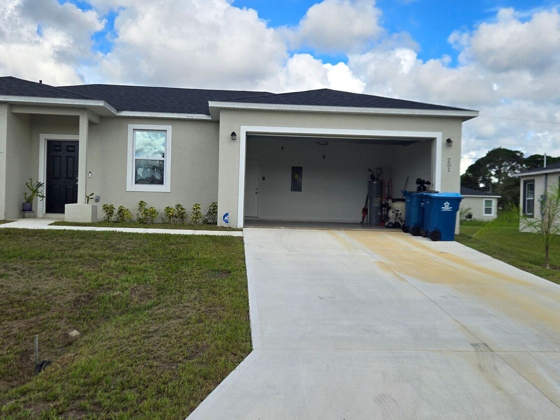 Primary Photo - 4 Bedroom Single Family Home in Palm Bay