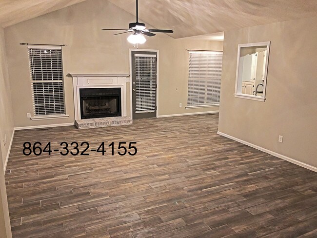 Living room with gas fireplace - 601 Savannah Ct