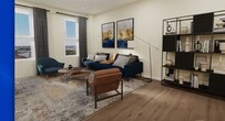 This 870-square-foot, one-bedroom, one-bathroom apartment is thoughtfully designed with a modern aesthetic and efficient single-floor layout. The open-concept living and kitchen area serves as the heart of the unit, where warm hardwood flooring flows throughout. The kitchen is outfitted with dark espresso cabinetry, white quartz countertops, a large central island, white subway tile backsplash, and stainless steel appliances including a gas range, built-in microwave, and French door refrigerator — all illuminated by stylish pendant lighting. The adjoining living room offers generous natural light through large windows with city views, complemented by recessed lighting and a flush-mount ceiling fixture. The 150-square-foot bedroom features recessed lighting, a sliding-door closet, a high transom window, and plush carpeted flooring. The full bathroom includes a soaking tub with an overhead rain showerhead, white subway tile surround with a built-in shelf, a dark wood vanity with a white countertop, and light gray tile flooring. Throughout, warm cream-toned walls create a cohesive, contemporary ambiance suitable for modern urban living.