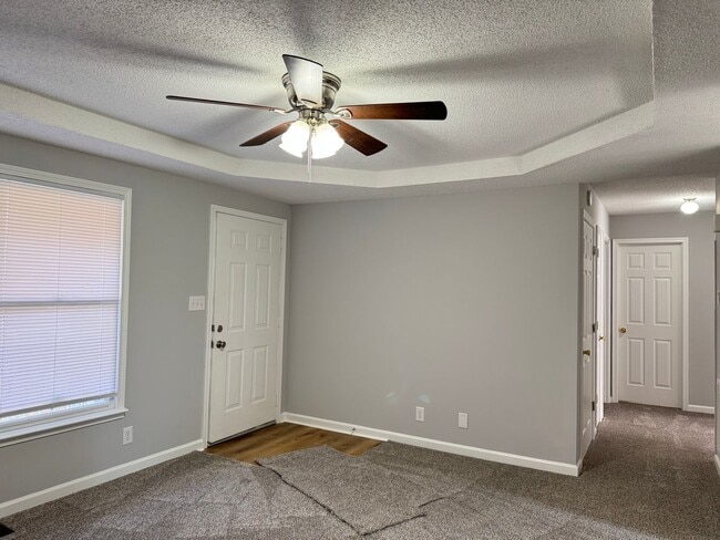 Building Photo - Just Painted and New Flooring Throughout! ...