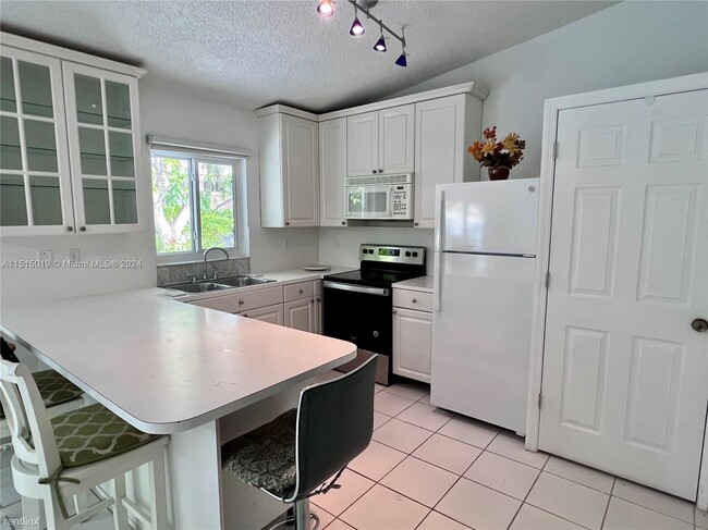 Foto del edificio - 3 br, 2 bath House - 9617 SW 144th Pl # 9617