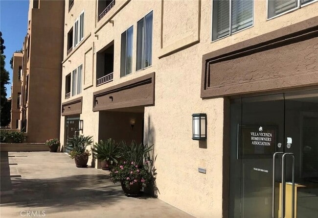 Building Photo - 8889 Caminito Plaza Centro