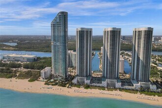 Building Photo - 15811 Collins Ave