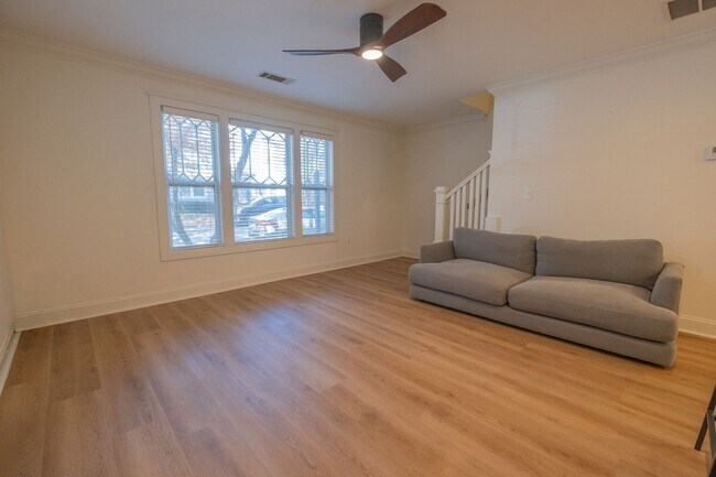 Building Photo - The Woodlands Unit 105