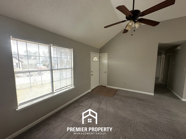 Photo - Cozy 3-Bedroom Memphis Rental with Brick Fireplace, High Ceilings & Fenced Yard House