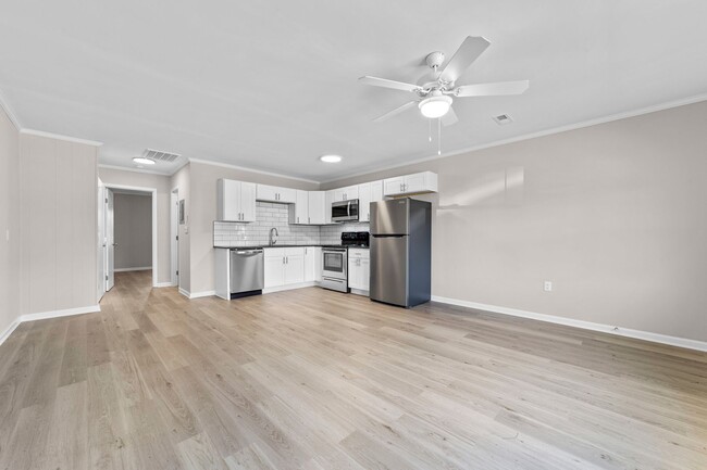 Building Photo - Gorgeously Renovated Apartments - Warm up ...