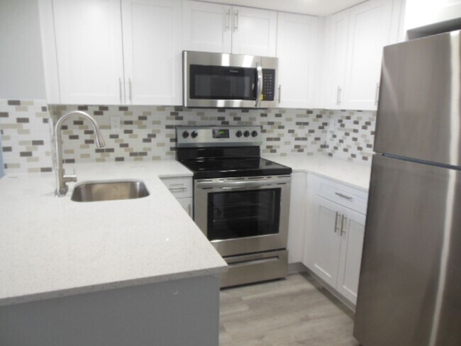 Building Photo - One Bedroom One Bathroom! WATERFRONT COMMU...