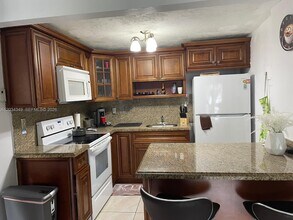 Building Photo - 4275 NW S Tamiami Canal Dr