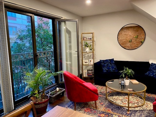 Beautiful double door windows open completely to overlook courtyard - 1000 Fell St Apartments