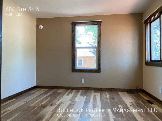 Building Photo - Beautifully updated house with 2 decks and...