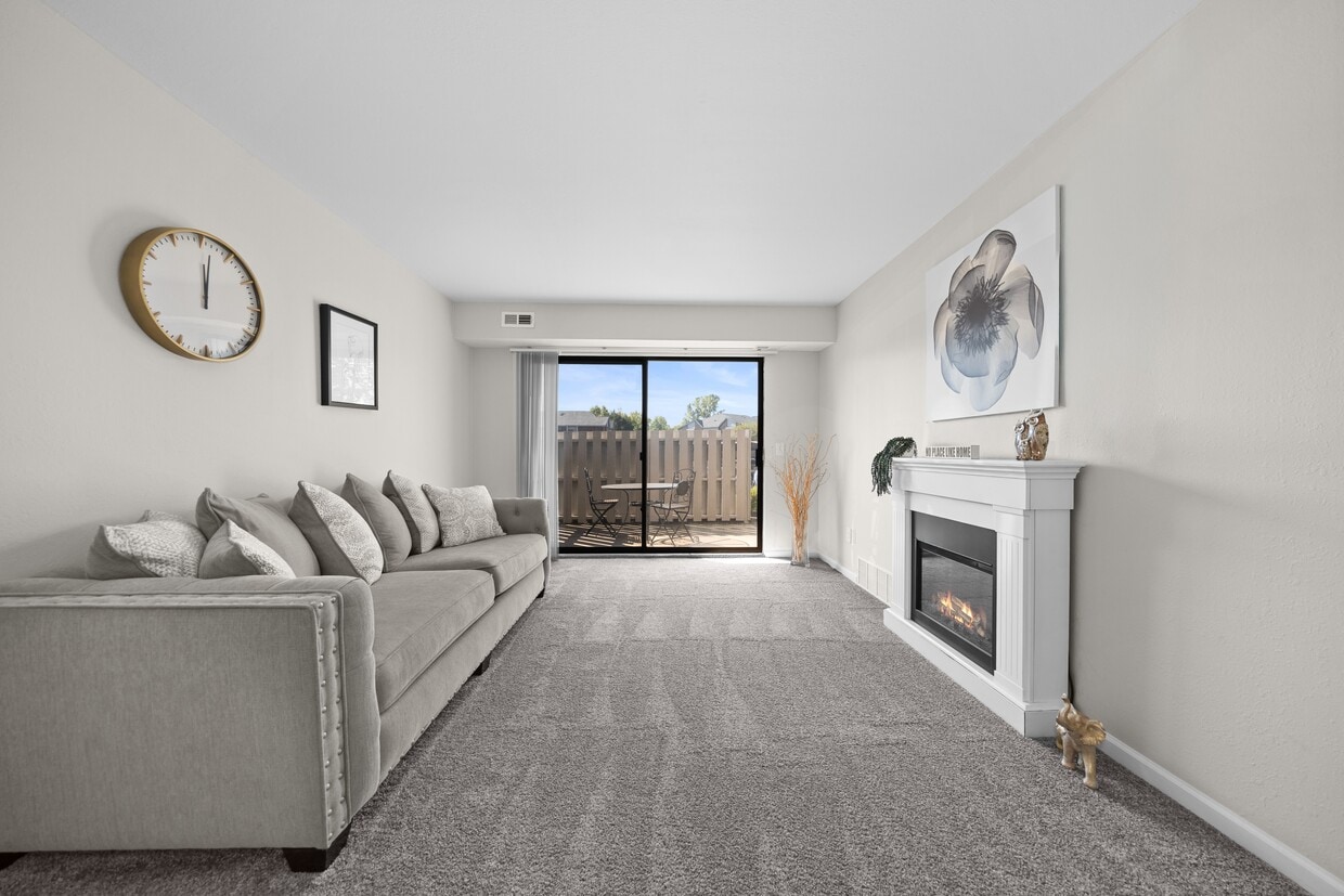 Living Room with Natural lighting at Three Oaks Apartments in Troy, MI - Three Oaks Apartments