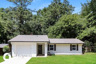 Building Photo - 9073 Woodgreen Way