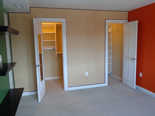 Bedroom closets (open) - 1417 Newton St NW Apartment