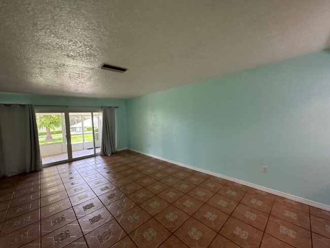 Building Photo - Enjoy the Best of Florida Living with a Pr...