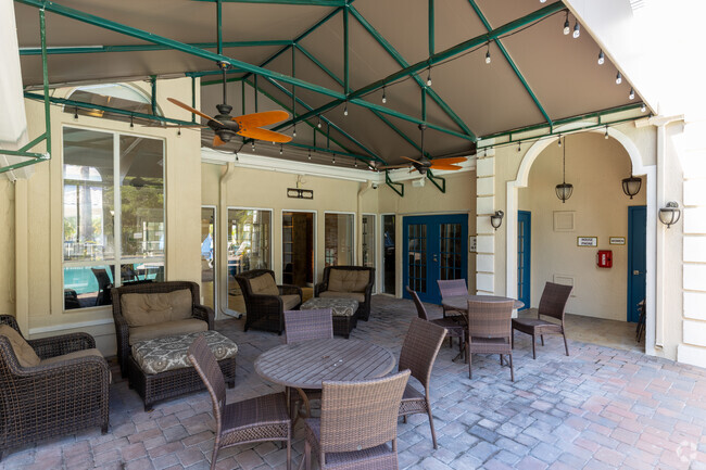 Pool Covered Seating Area - Saratoga Resort Villa Apartments