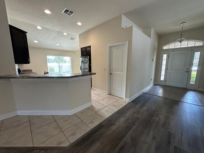 Building Photo - Spacious 4 Bedroom Home with Fenced Yard a...