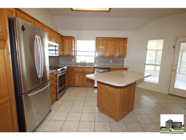 Building Photo - Soak up the sun in the sunroom with a SPEC...
