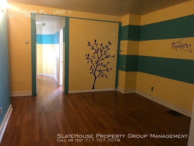 Building Photo - First floor two bedroom with fenced in yard