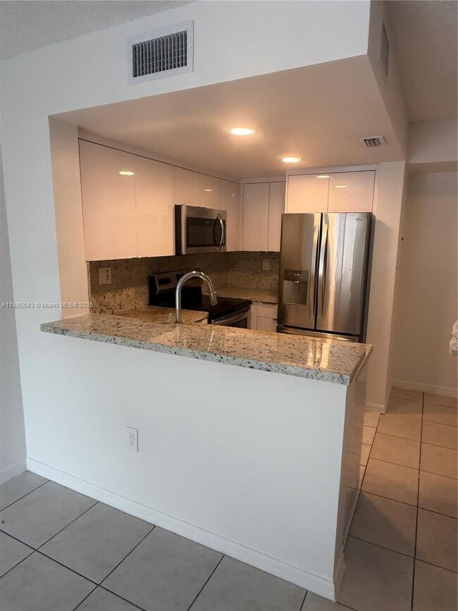 Building Photo - 8585 NW 6th Ln