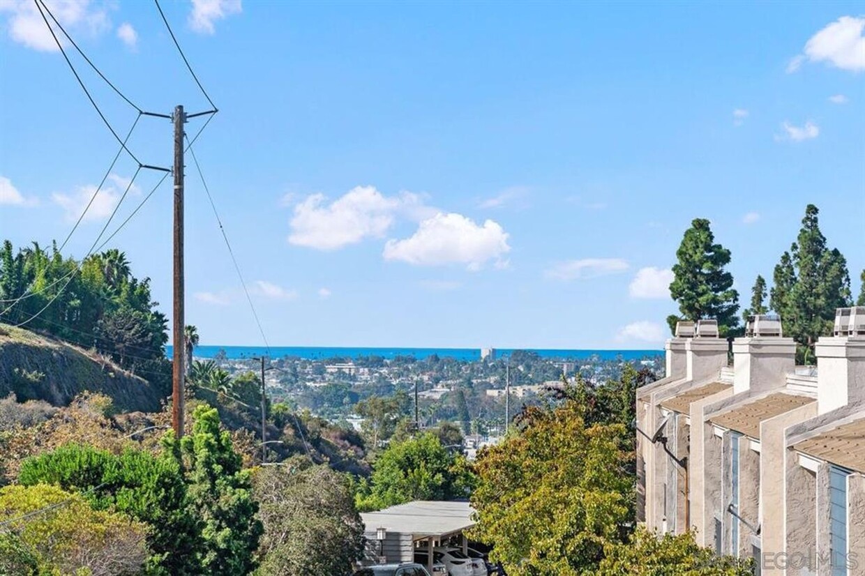 Primary Photo - Ocean View, Balconies & Private Patio!!