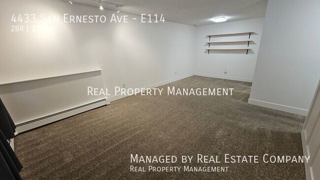 Building Photo - Two Bedroom Condo w/ Carport and Secure Entry