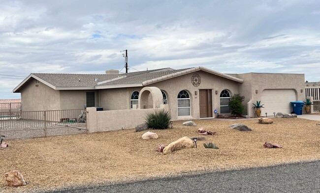 Building Photo - Beautifully Fully Furnished Longterm Pool Home