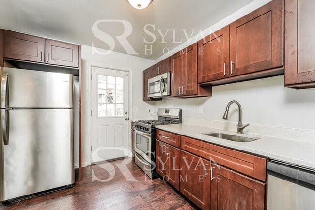 Building Photo - This highly desirable 4 bedroom, 2 bathroo...