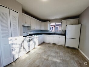 Building Photo - 8703-8727 27 Ave NW