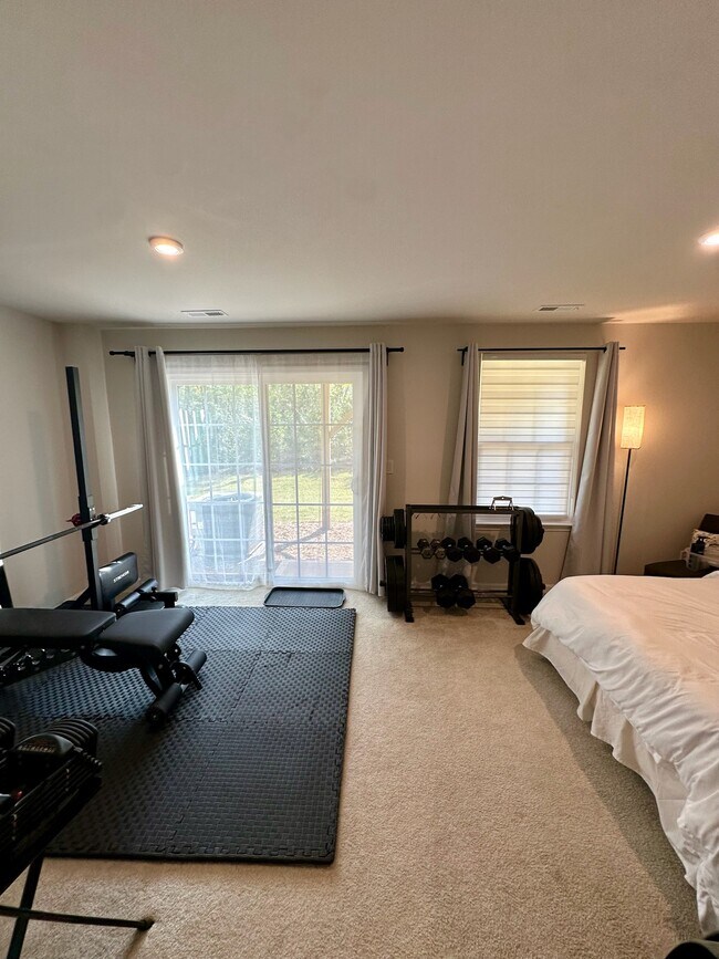 Rec room with sliding door to backyard - 4022 Edenborn Ln