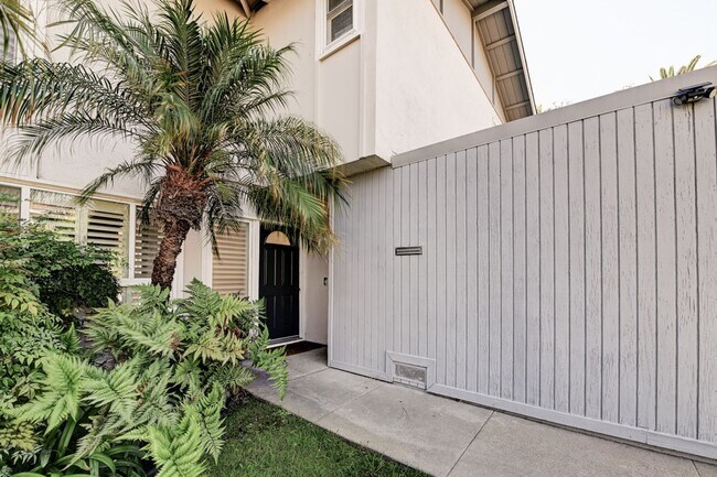 Building Photo - Updated, 3 bedroom 2.5 bath townhouse located in the Newport Riviera Community