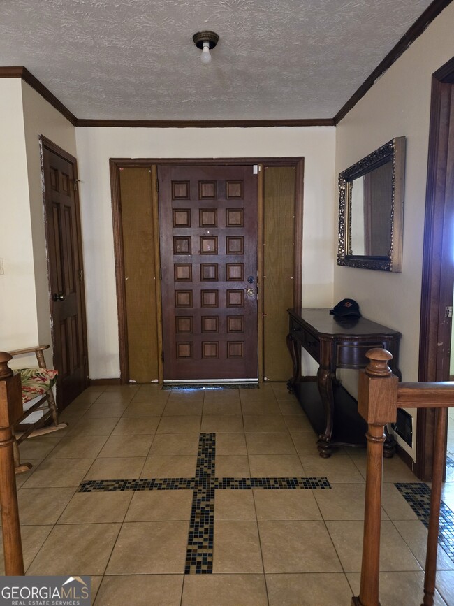 Foto del edificio - 4666 Tara Woods Dr