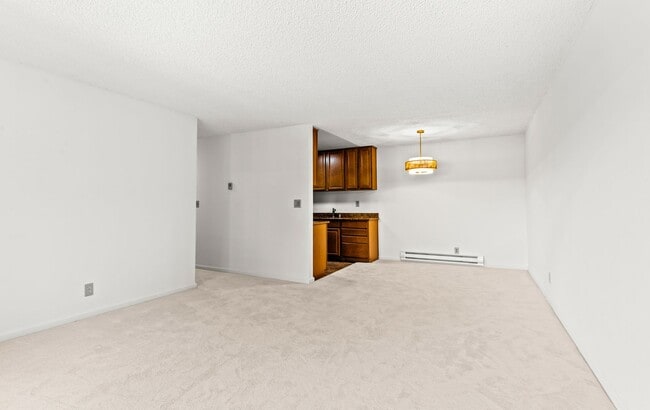Building Photo - Modern 2-Bedroom Condo with Pool and Koi Pond Views
