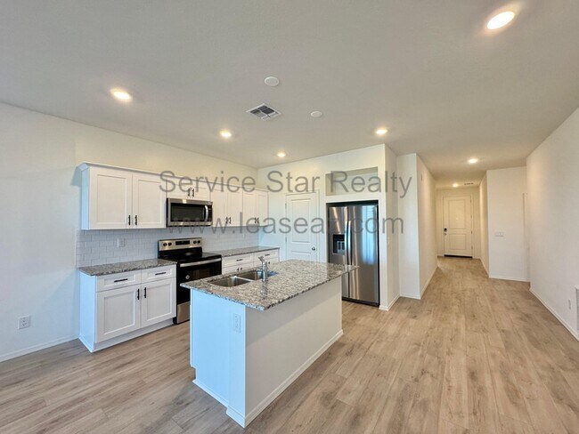 Foto del edificio - 18100 W Soft Wind Dr