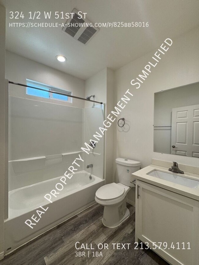 Building Photo - 324 1/2 W 51st St-