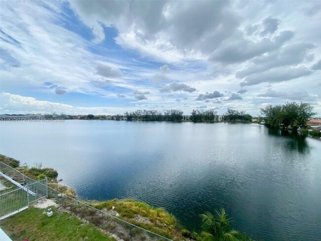 Building Photo - 9911 W Okeechobee Rd
