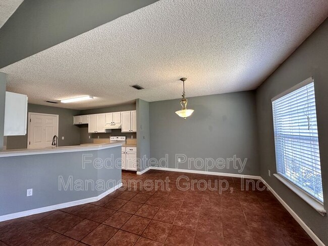 Building Photo - 9007 Bridgecreek Dr W