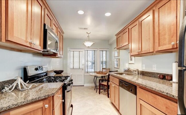 kitchen looking into balcony - 402 Commonwealth Ave