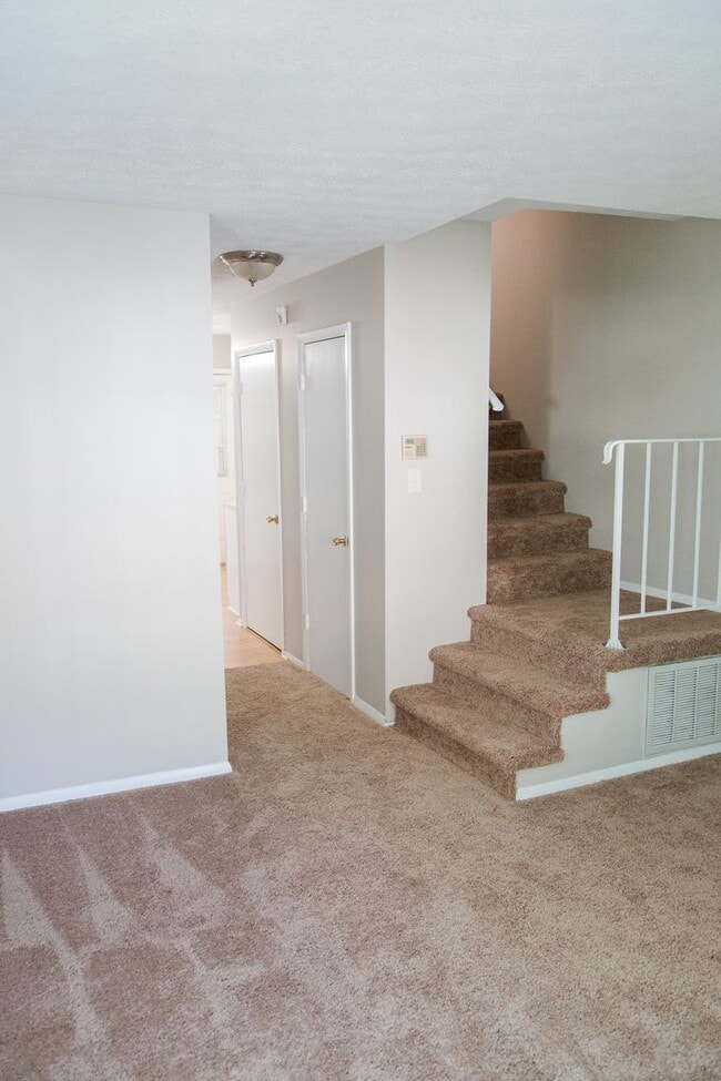 Building Photo - Enjoy Freshly Painted Open Floor Plan!