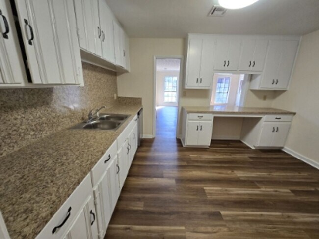 Building Photo - Den and Living Room and No Carpet Anywhere