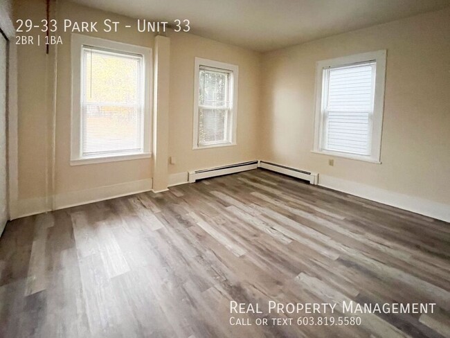 Building Photo - Pet-Friendly, Downtown 2-Bed with Heat and...