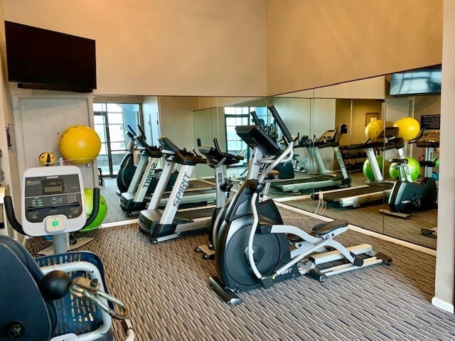 Updated Fitness Room - Wood Creek Apartments