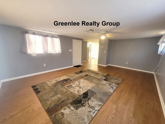 Building Photo - Cozy 2 Bed/1 Bath Duplex Apt with a Carport and Large Fenced Back Yard!