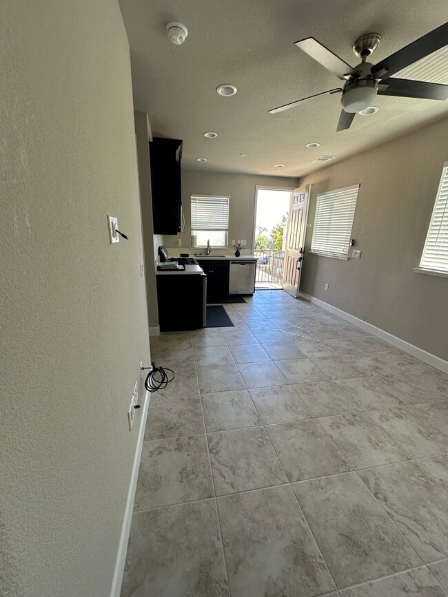 View from Bedroom into living room & kitchen - 1807 Perennial Terrace