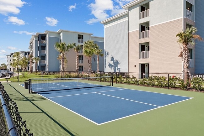 Outdoor tennis courts available at Cape at Savona Point Apartments - Cape at Savona Point